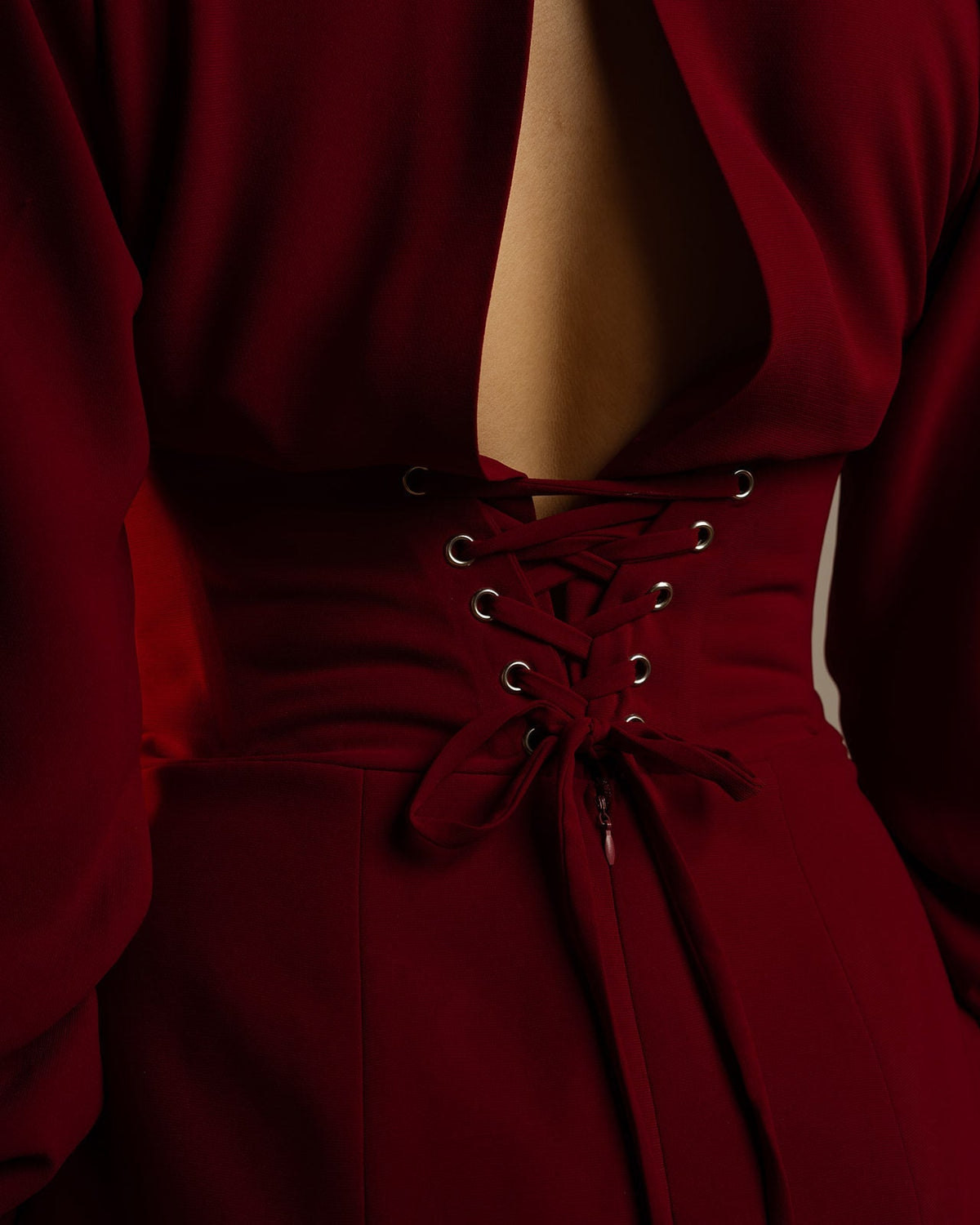 Elegant maroon dress with open back and lace-up corset detail, premium women's fashion