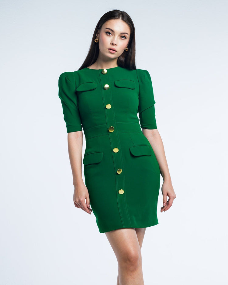 Woman modeling elegant green button-front dress with puff sleeves and gold accents